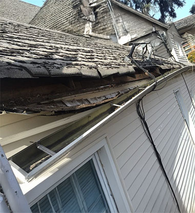 Damaged fascia board on a Salt Lake County home in need of repair
