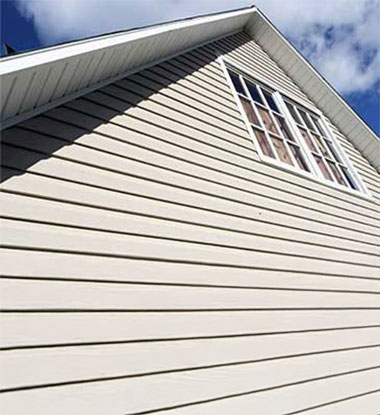 New vinyl siding installation on a home in Salt Lake County
