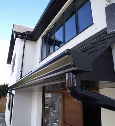 Close up of aluminum gutters on a contemporary Salt Lake County house
