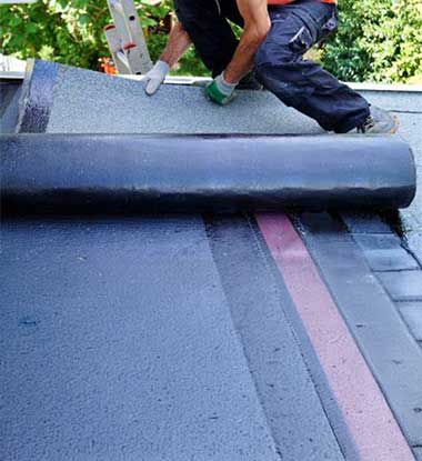 Crew performing roof installation in Utah County neighborhood
